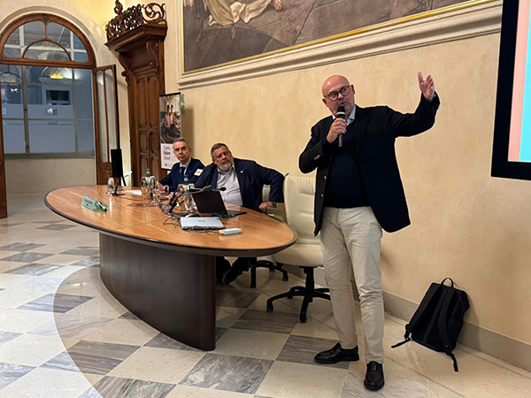 Al tavolo da sinistra Pietro Boselli Giuseppe La Scala e Filippo La Scala in piedi